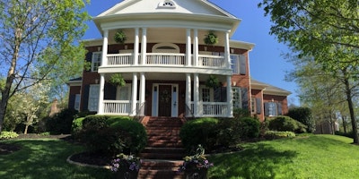 Exterior white paint on balcony, porch, roof - Residential painting by Nash Painting Nashville TN
