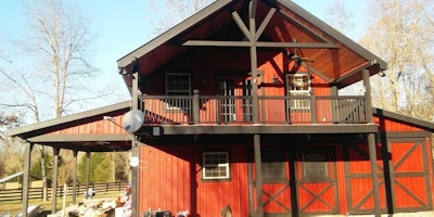 Exterior red and black paint on barn-style home - Residential painting by Nash Painting Nashville TN