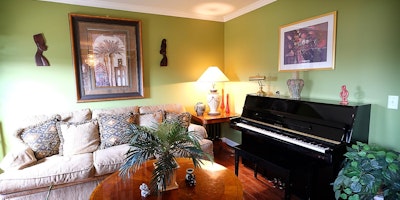Green room with piano - Residential painting by Nash Painting Nashville TN